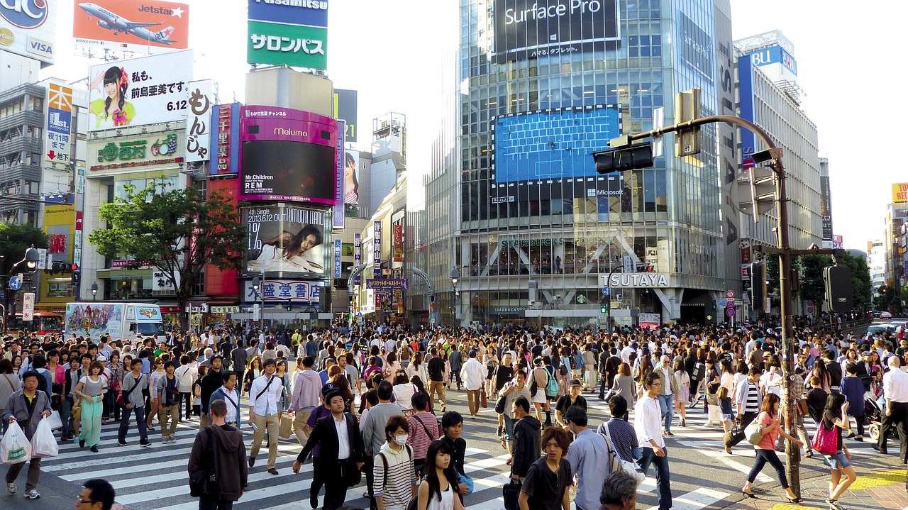 Pedestrians at Shibuya Scramble Crossing in Tokyo